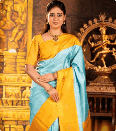 Model in a yellow and sky-blue silk saree
